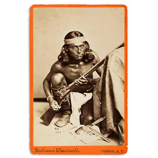 (AMERICAN INDIANS--PHOTOGRAPHS.) Cabinet card of the: (AMERICAN INDIANS--PHOTOGRAPHS.) Cabinet card of the Apache scout Nantaje, who was awarded the Medal of Honor. Albumen print, 6 x 4 inches, on photographer's mount without caption, numbered in the