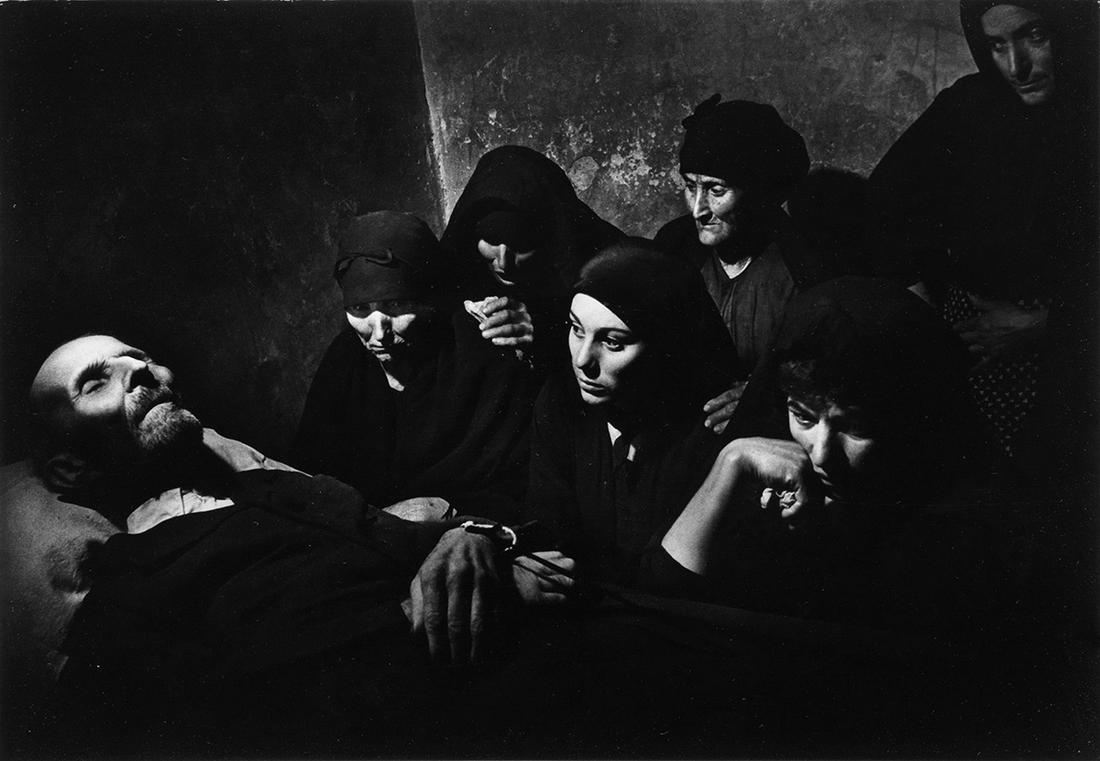 W. EUGENE SMITH (1918-1978) Spanish Wake.: W. EUGENE SMITH (1918-1978) Spanish Wake. Silver print, the image measuring 8x13 inches (22x33.3 cm.), the sheet 11x14 inches (27.9x35.6 cm.), with the Estate of W. Eugene Smith hand stamp, on verso.