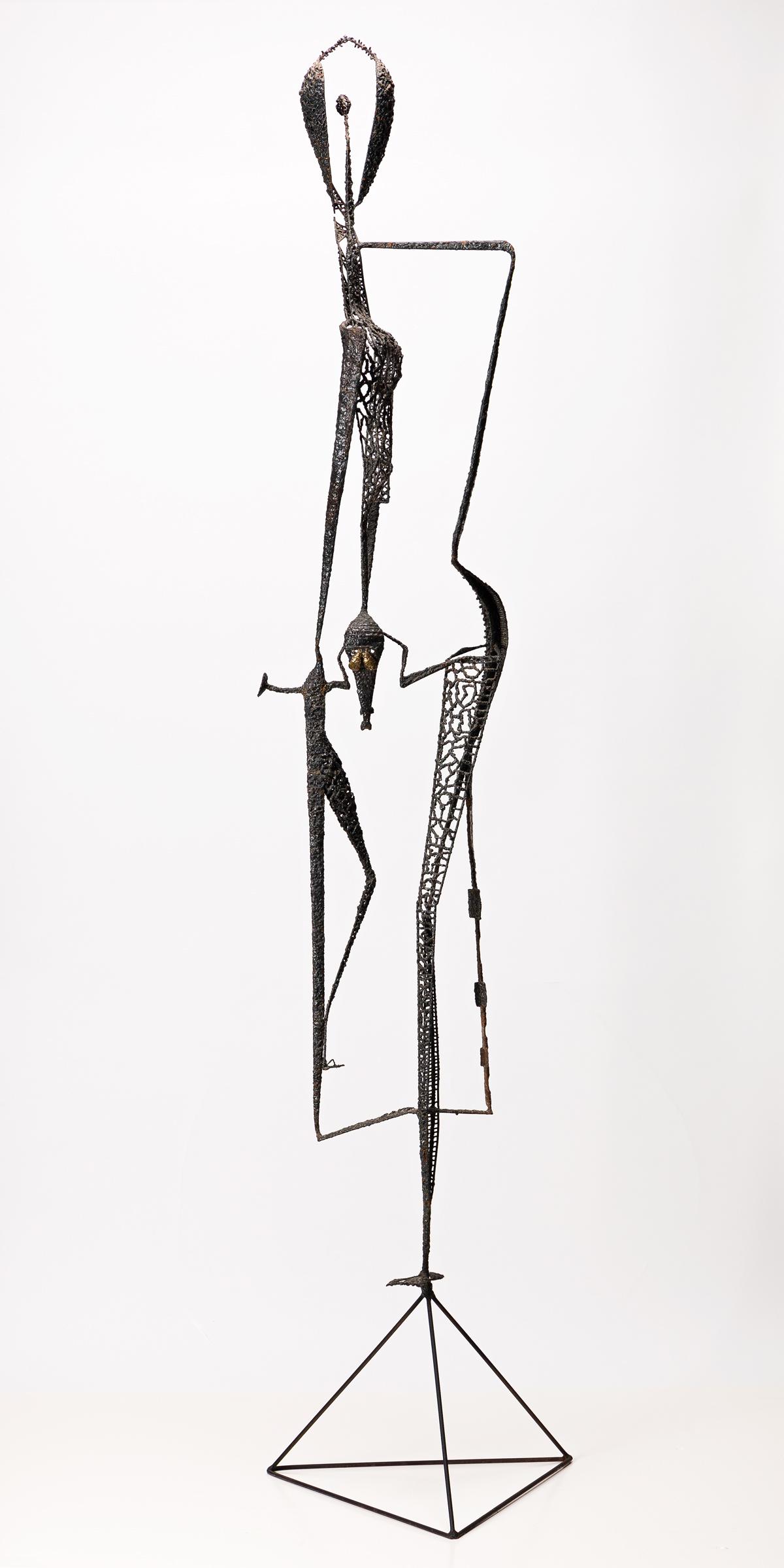 DAVID HARE, (1917 - 1992, AMERICAN) Figure in the: DAVID HARE, (1917 - 1992, AMERICAN) Figure in the Windows. Braised steel weldement, 1955. 2089 mm; 82 inches high. Signed, Hare.Provenance: Gruenebaum Gallery, Ltd., NY.