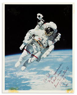 (ASTRONAUTS.) MCCANDLESS II, BRUCE. Photograph Signed: (ASTRONAUTS.) MCCANDLESS II, BRUCE. Photograph Signed and Inscribed, "To Ed / With appreciation / & best wishes / Bruce McCandless II / STS-41B / STS-31," full-length portrait showing him from the