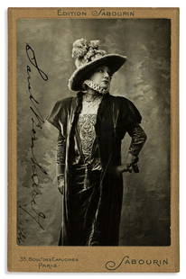 BERNHARDT, SARAH. Photograph dated and Signed, cabinet: BERNHARDT, SARAH. Photograph dated and Signed, cabinet card, ¾-length portrait by Sabourin, showing her in costume as Élisabeth in Les Amours de la reine Élisabeth. Signed vertically