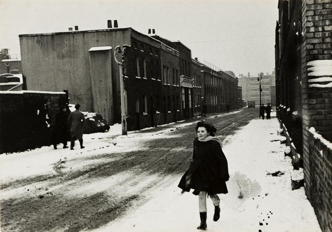 ROGER MAYNE (1929-2014) Snow in Bethnal Green, London.: ROGER MAYNE (1929-2014) Snow in Bethnal Green, London. Silver print, the image measuring 6¾x9 inches (17.2x24.4 cm.), with Mayne's signature, title, date, printing notations, and address, in ink,
