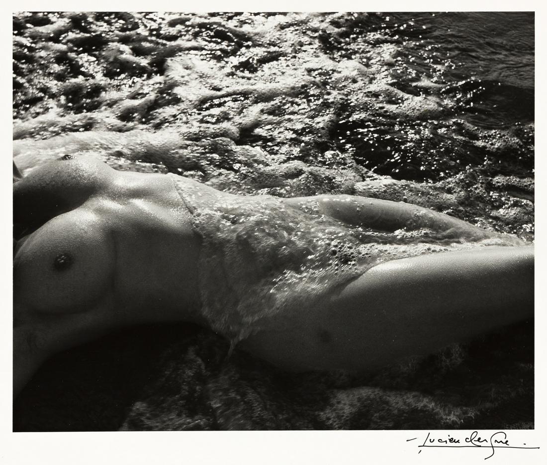 LUCIEN CLERGUE (1934-2014) Nude in the sea.: LUCIEN CLERGUE (1934-2014) Nude in the sea. Silver print, the image measuring 8x9 inches (20.3x25.1 cm.), the sheet 9½x12 inches (24.1x30.5 cm.), with Clergue's signature, in ink, on recto, and h