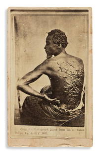 (SLAVERY AND ABOLITION.) [McPherson & Oliver;: (SLAVERY AND ABOLITION.) [McPherson & Oliver; photographers.] [The Scourged Back.] Albumen photograph, 3½ x 2 inches, on original plain mount without any publisher's mark; minor wear. Np, circa