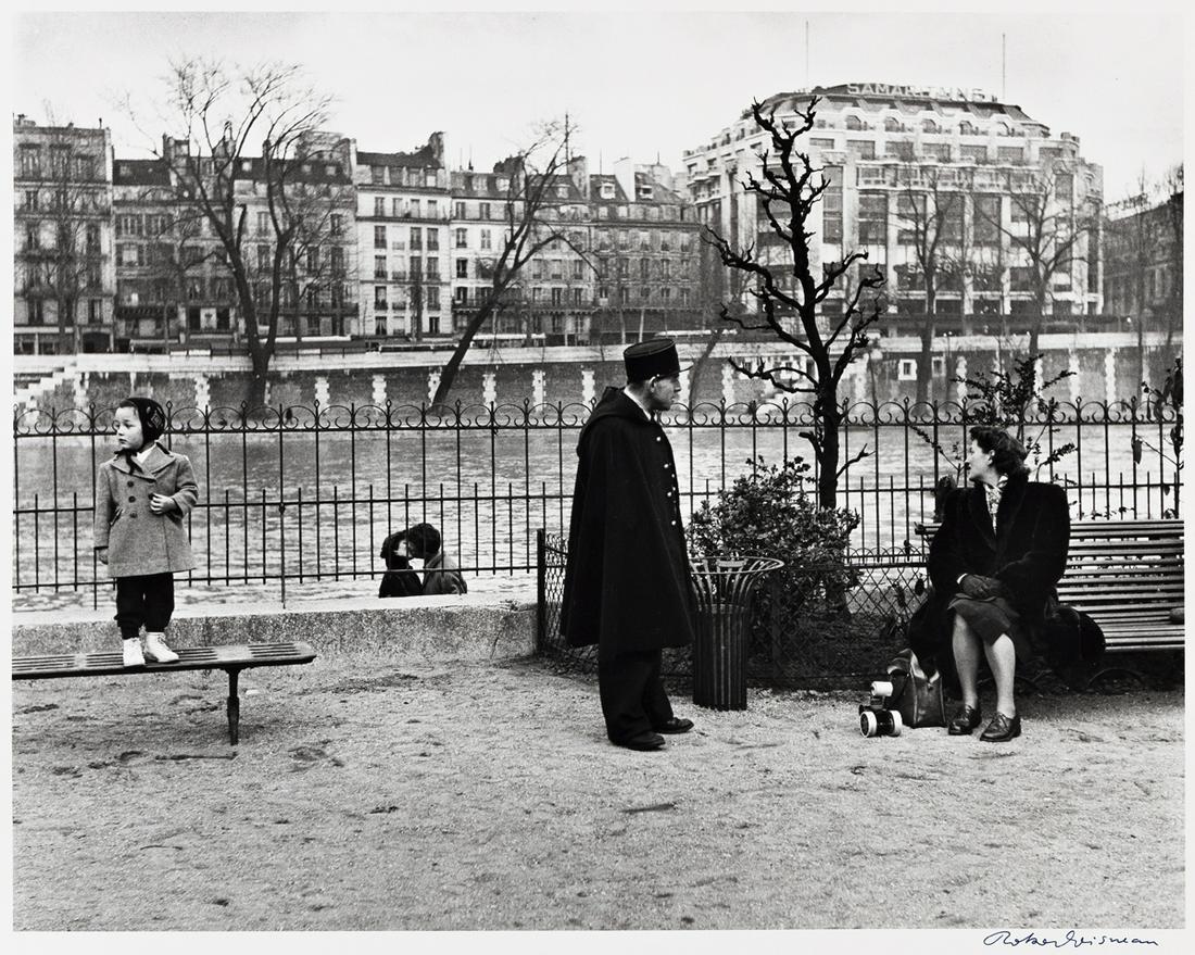 ROBERT DOISNEAU (1912-1994) Le Vert Galant.: ROBERT DOISNEAU (1912-1994) Le Vert Galant. Silver print, the image measuring 15½x19 inches (39.4x49.8 cm.) , the sheet 18x22 inches (48x58.1 cm.) , with Doisneau's signature, in ink, on recto, a