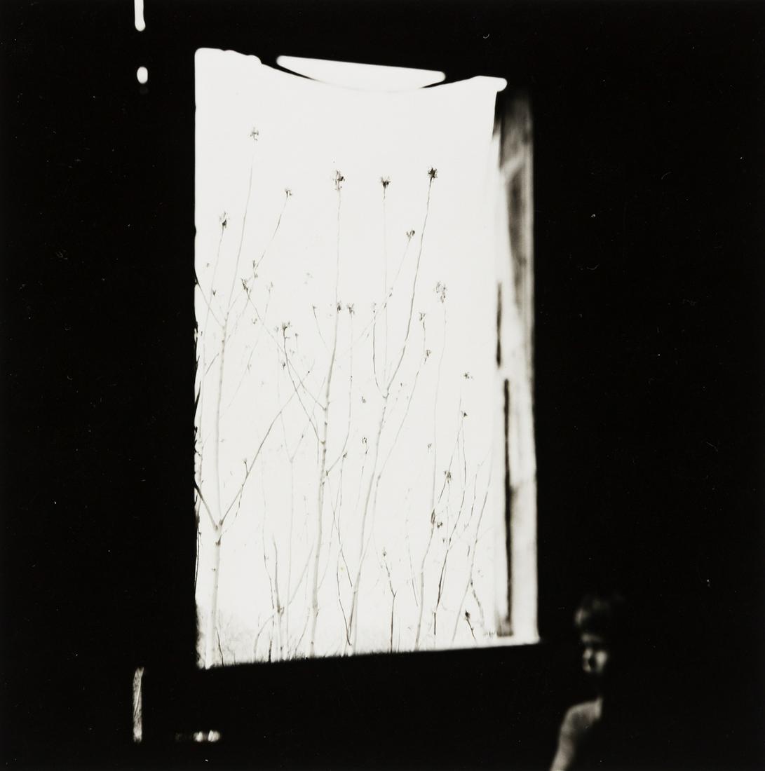 RALPH EUGENE MEATYARD (1925-1972) Boy by window.: RALPH EUGENE MEATYARD (1925-1972) Boy by window. Silver print, the image measuring 7½ inches (19.1 cm.) square, the sheet 8x10 inches (20.3x25.4 cm.) , with Madelyn O. Meatyard's signature, in in