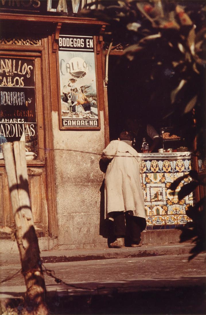 SAUL LEITER (1923-2013) Man on the street, Camarena,: SAUL LEITER (1923-2013) Man on the street, Camarena, Spain. Chromogenic print, the image measuring 13x8½ inches (33x21.6 cm.) , the sheet 14x11 inches (35.6x27.9 cm.) . Circa 1959; printed 1980s