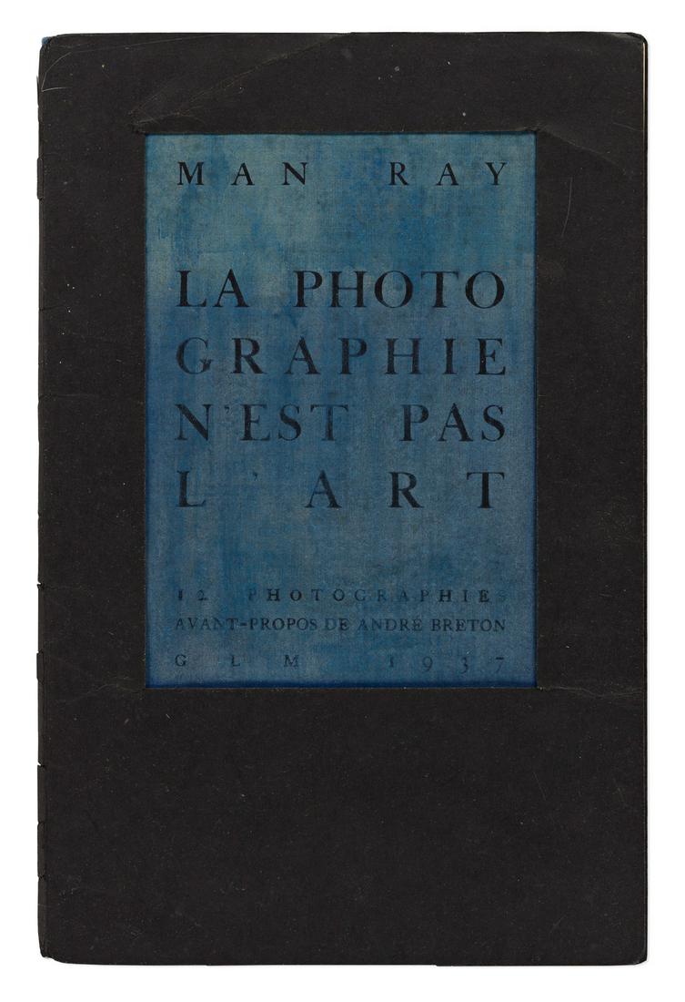 MAN RAY (1890-1976) La Photographie n'est pas l'Art.: MAN RAY (1890-1976) La Photographie n'est pas l'Art. Foreword by André Breton. Illustrated with 12 reproductions of Man Ray's photographs. 8vo, stamped blue wrappers, sunned; with the black die-c