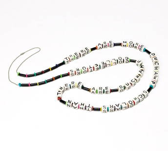 NAOMI SAVAGE (1927-2005) There are more Duchamp: NAOMI SAVAGE (1927-2005) There are more Duchamp scholars than there are Duchamp collectors. Glass and glazed ceramic bead necklace on a ball chain. 1560 mm; 61 inches (length). Made for Virginia Zabri