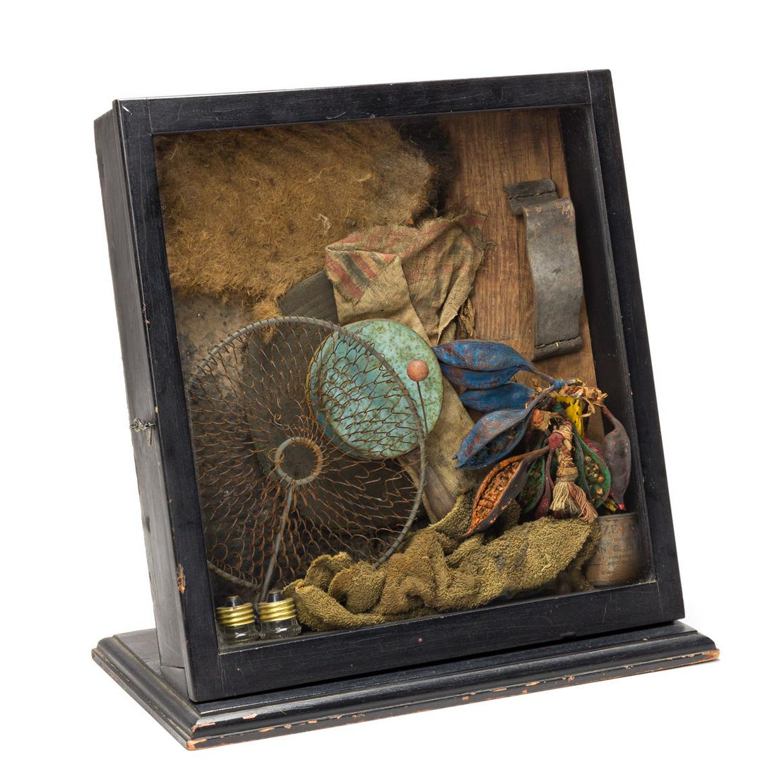 KARL MANN (1930 - ) Box #1.: KARL MANN (1930 - ) Box #1. Wooden box construction assemblage with found objects. 420x420x205 mm; 16½x16½x8 inches. Circa 1975.Provenance: D'Arcy Galleries, New York, with the label verso.
