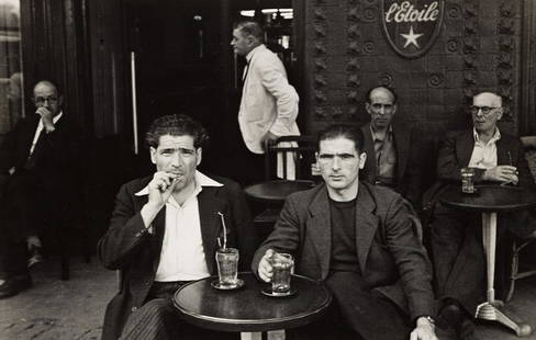 RUDY BURCKHARDT (1914-1999) Two men at CafÃ© L'Etoile,: RUDY BURCKHARDT (1914-1999)Two men at CafÃ© L'Etoile, Paris. Silver print, the image measuring 6x9 inches (15.5x24.4 cm.), the sheet slightly larger, with Burckhardt's hand stamp and numeric