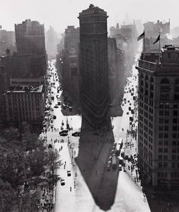 RUDY BURCKHARDT (1914-1999) Flatiron Building in: RUDY BURCKHARDT (1914-1999)Flatiron Building in Summer. Silver print, the image measuring 9x7½ inches (22.9x19.1 cm.), the sheet slightly larger, with Burckhardt's signature, title, and