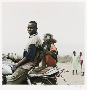 PIETER HUGO (1976- ) Motorbike Rider with Amiloo,: PIETER HUGO (1976- )Motorbike Rider with Amiloo, Nigeria. Archival pigment print, the image measuring 20 inches (50.8 cm.) square, the sheet 24¾x24 inches (62.9x61 cm.), with Hugo's signature,