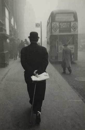 FRANK, ROBERT (1924- ) "London.": FRANK, ROBERT (1924- ) "London." Silver print, 9 1/4x6 inches (23.5x15.4 cm.), with Frank's faint ink signature and caption "1950 London," on recto, and a Robert Frank Archive hand stamp with pencile