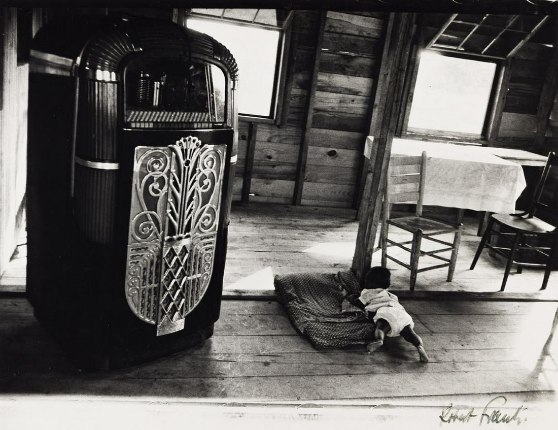 ROBERT FRANK (1924-2019) Café, Beaufort, South: ROBERT FRANK (1924-2019) Café, Beaufort, South Carolina. Silver print, the image measuring 10x13¾ inches (25.4x34.9 cm.), the sheet 11x14 inches (27.9x35.6 cm.), with Frank's signature, in i