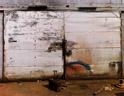 WILLIAM CHRISTENBERRY (1936-2016) Door of Auto Repair: WILLIAM CHRISTENBERRY (1936-2016) Door of Auto Repair Shop, Near Tuscaloosa, Alabama. Dye transfer print, the image measuring 14¾x19 inches (37.5x48.3 cm.), the sheet 18¾x22¾ inches (47