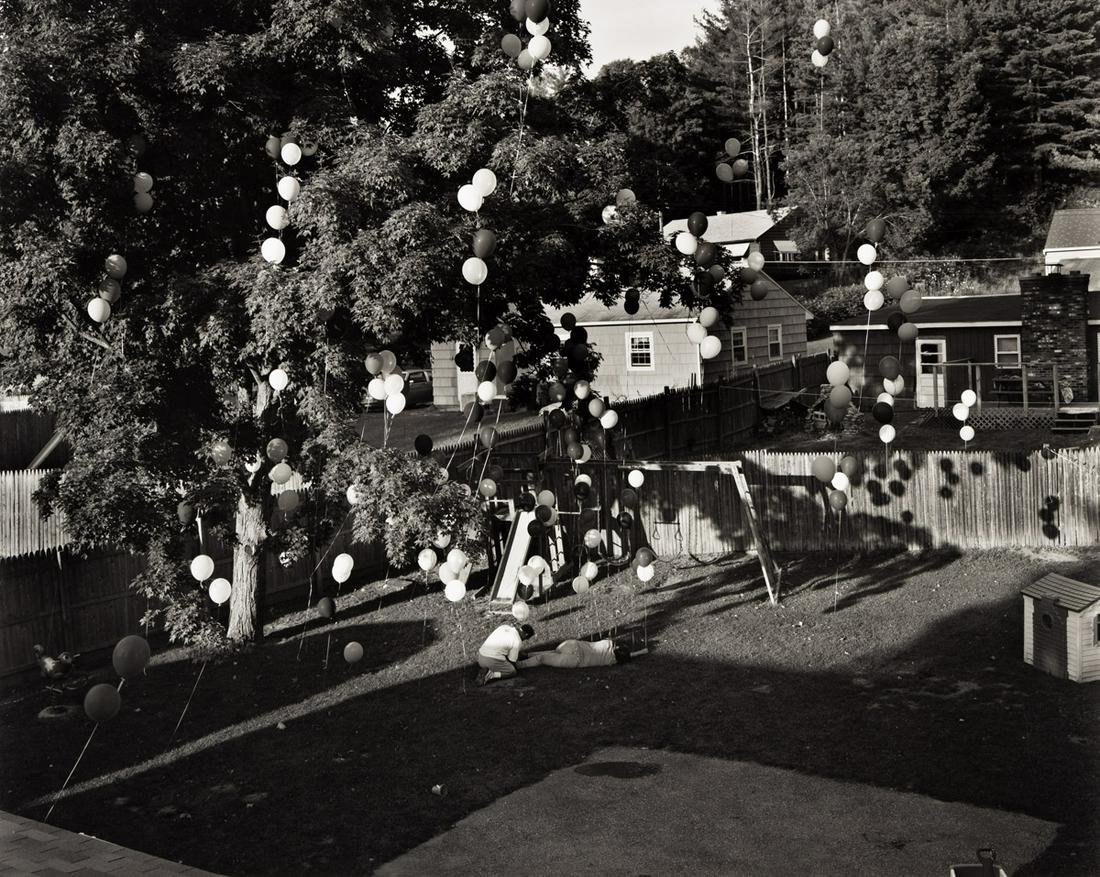 GREGORY CREWDSON (1962- ) Untitled (balloons in: GREGORY CREWDSON (1962- ) Untitled (balloons in backyard) from the series Hover. Silver print, the image measuring 18x22½ inches (45.7x57.1 cm.), the sheet slightly larger, flush mounted; with Cr