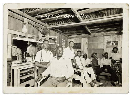 (BUSINESS.) Photograph of the Boyd and Miller Barber Shop.: (BUSINESS.) Photograph of the Boyd and Miller Barber Shop. Photograph, 5 x 7 inches, captioned in the negative; moderate wear. Hammond, LA?, probably May 1941 Two barbers stand by two customers in the