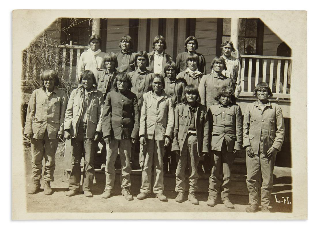 (AMERICAN INDIANS--PHOTOGRAPHS.) Photograph believed to depict Geronimo and other Apache prisoners. (1 of 1)