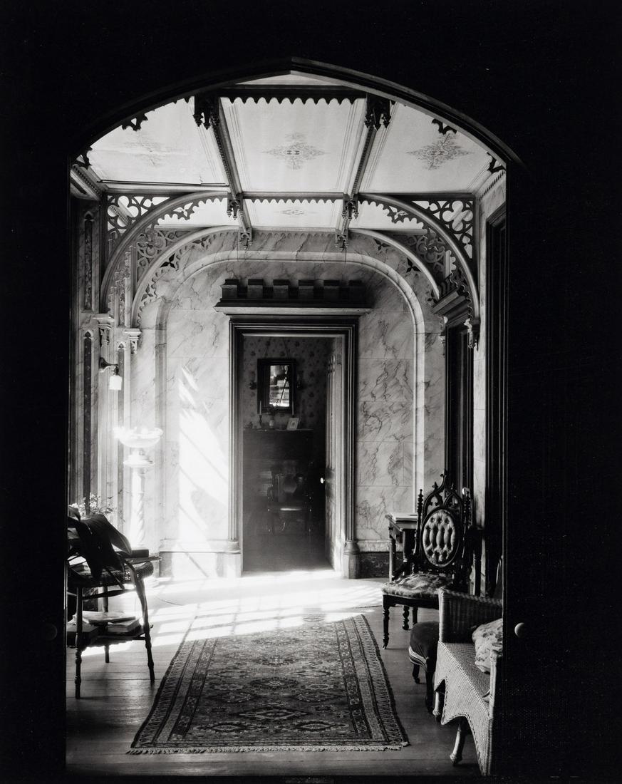 WALKER EVANS (1903-1975) Sitting room interior, through doorway, residence of Gifford Cochran,: WALKER EVANS (1903-1975) Sitting room interior, through doorway, residence of Gifford Cochran, Croton Falls, New York. Silver print, the image measuring 7¾x9¾ inches (19.7x24.8 cm.), the she