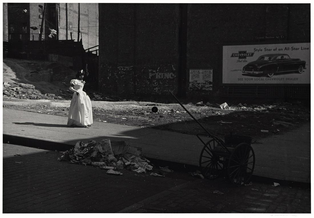 ROY DECARAVA (1919-2009) Graduation.: ROY DECARAVA (1919-2009) Graduation. Silver print, the image measuring 8x13 inches (22.5x32.8 cm.), the sheet 11x14 inches (27.7x35.3 cm.), with DeCarava's signature and negative date in ink on recto.