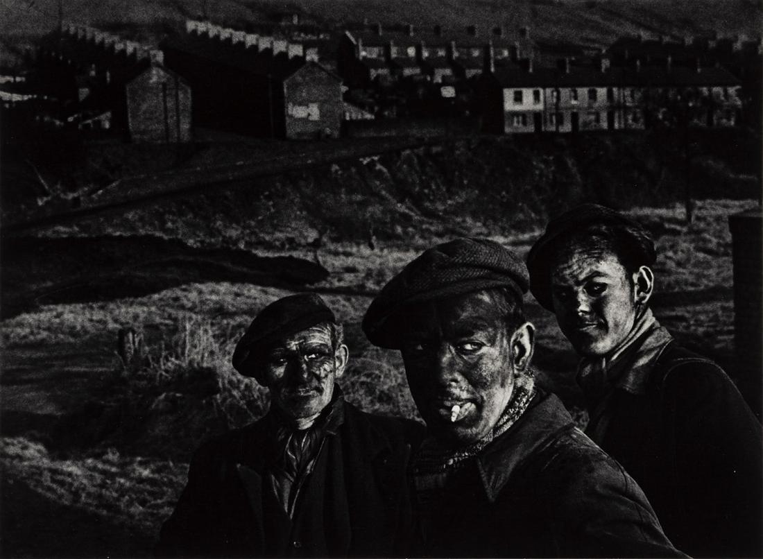 W. EUGENE SMITH (1918-1978) Welsh Miners.: W. EUGENE SMITH (1918-1978) Welsh Miners. Silver print, the image measuring 9½x13 inches (24.1x33 cm.), the mount 16x20 inches (40.6x50.8 cm.), with Smith's signature and title in pencil on mount