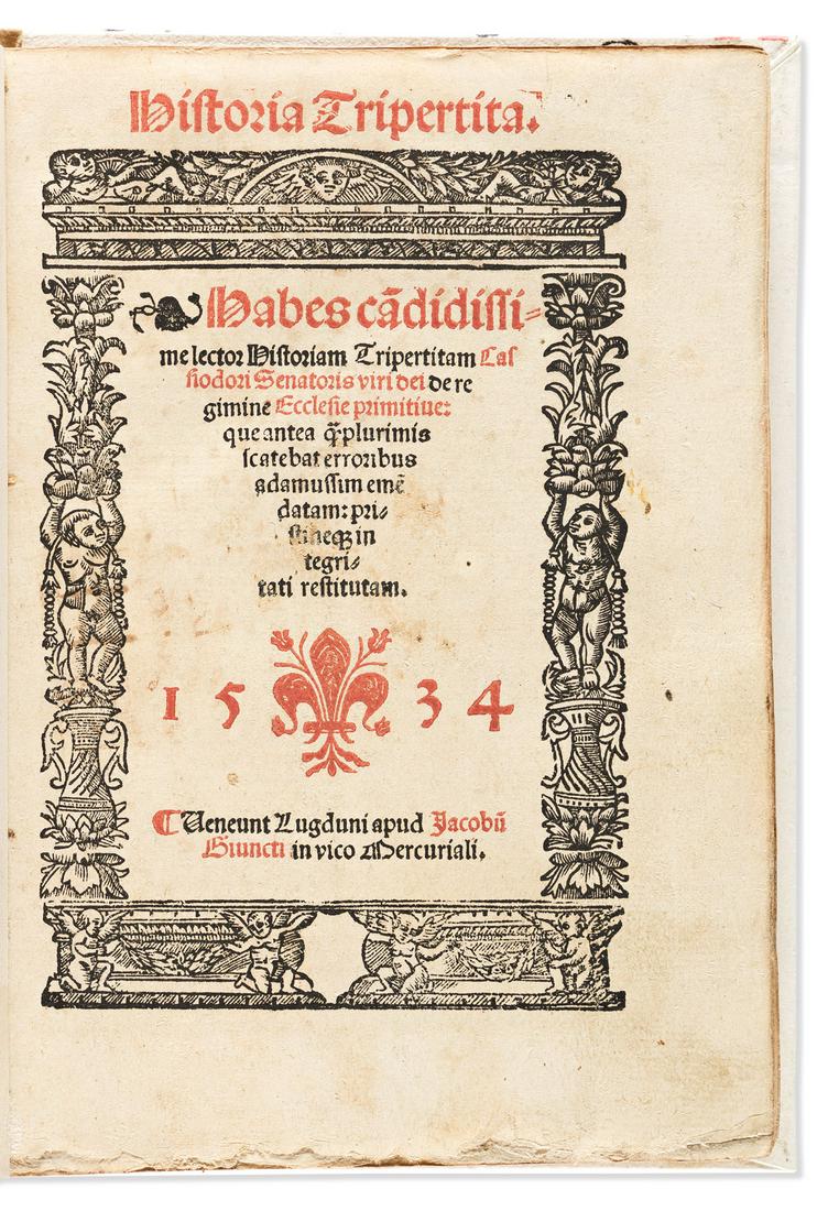 Cassiodorus, Flavius Magnus Aurelius (c. 485-585 CE) Historia Tripertita.: Cassiodorus, Flavius Magnus Aurelius (c. 485-585 CE) Historia Tripertita. Lyon: Jacob Giunta, 1534.Large octavo, title page printed in red and black within an architectural woodcut border, text in got