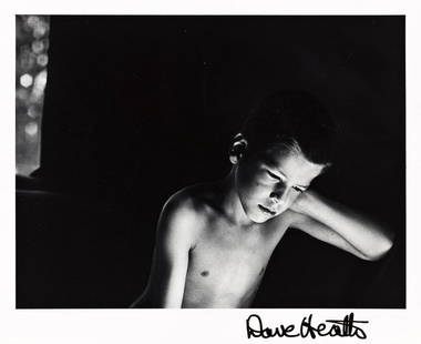 DAVE HEATH (1931-2016) Boy leaning on arm.: DAVE HEATH (1931-2016) Boy leaning on arm. Silver print, the image measuring 4x5¼ inches (10.2x13.3 cm.), the sheet 5x7 inches (12.7x17.8 cm.), with Heath's signature in ink on recto and the nota