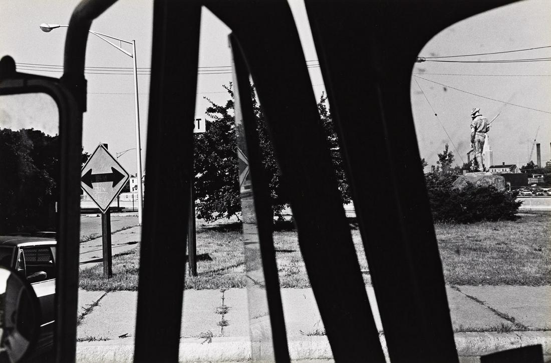 LEE FRIEDLANDER (1934- ) Statue, New Jersey.: LEE FRIEDLANDER (1934- ) Statue, New Jersey. Silver print, the image measuring 6x10 inches (16.8x25.4 cm.), the mount 15½x20 inches (39.4x50.8 cm.), with Friedlander's signature and edition notat