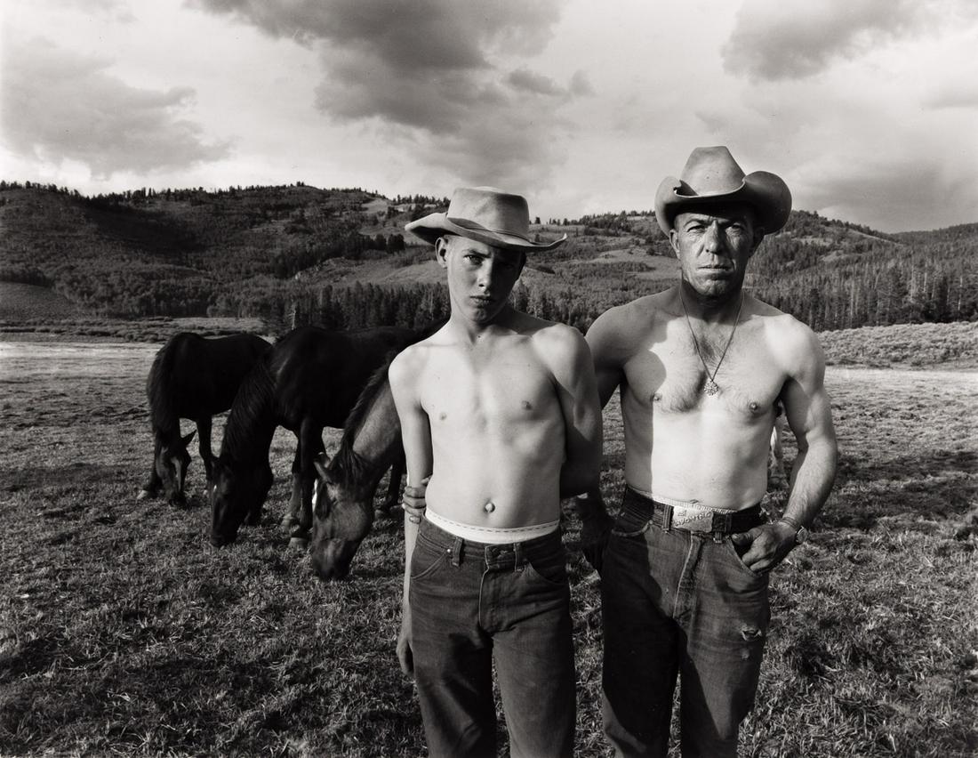 BRUCE DAVIDSON (1933- ) Father and Son, Pinedale, Wyoming.: BRUCE DAVIDSON (1933- ) Father and Son, Pinedale, Wyoming. Selenium-toned silver print, the image measuring 10x12 inches (25.4x32.7 cm.), the sheet slightly larger, a Davidson/Magnum label with Davids