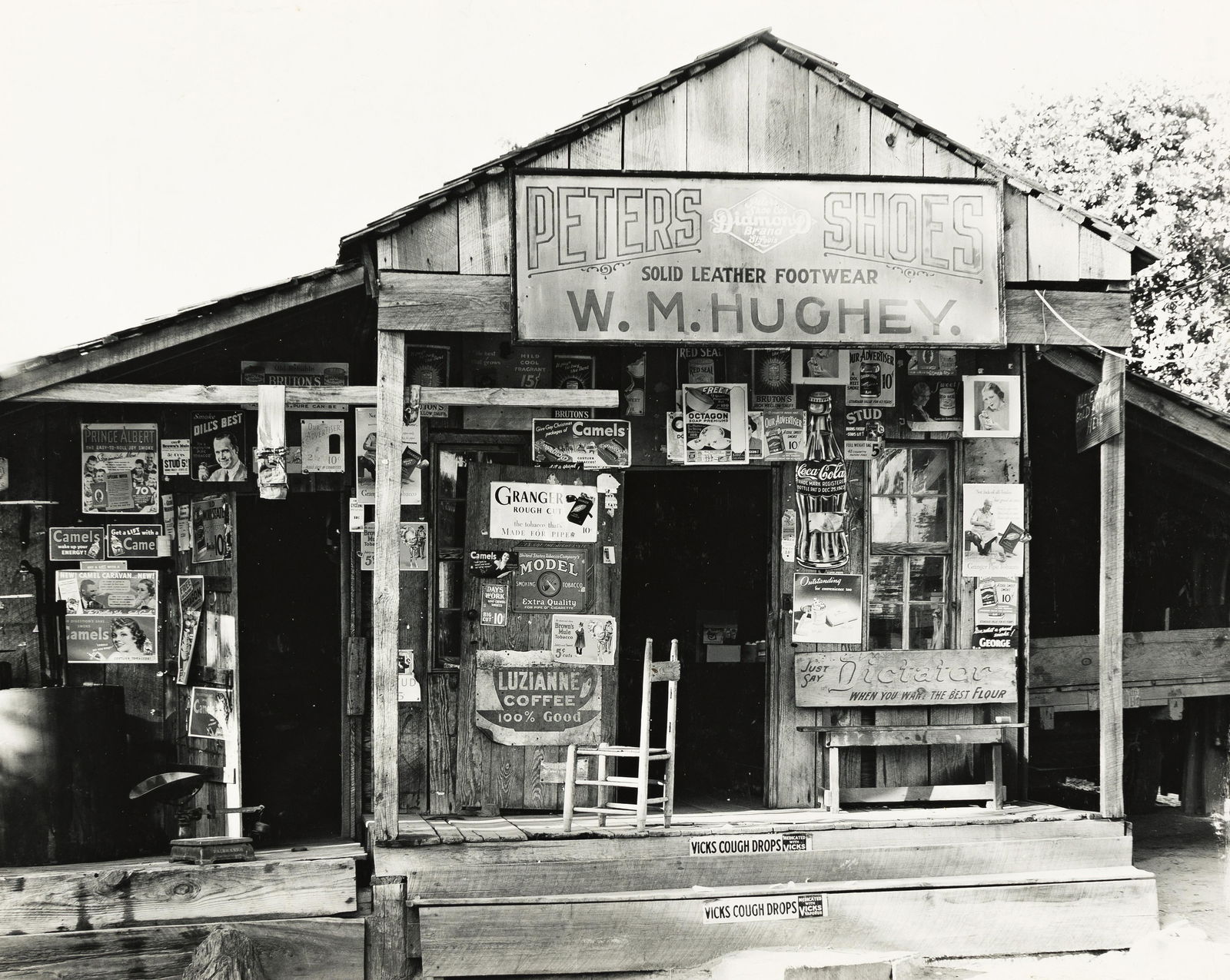 WALKER EVANS (1903-1975) Billboard, Birmingham, Alabama * Country Store, Vicinity Moundville,: WALKER EVANS (1903-1975)Billboard, Birmingham, Alabama * Country Store, Vicinity Moundville, Alabama * Butcher's Sign, Mississippi. Together, 3 silver prints, the first two images measuring approximat