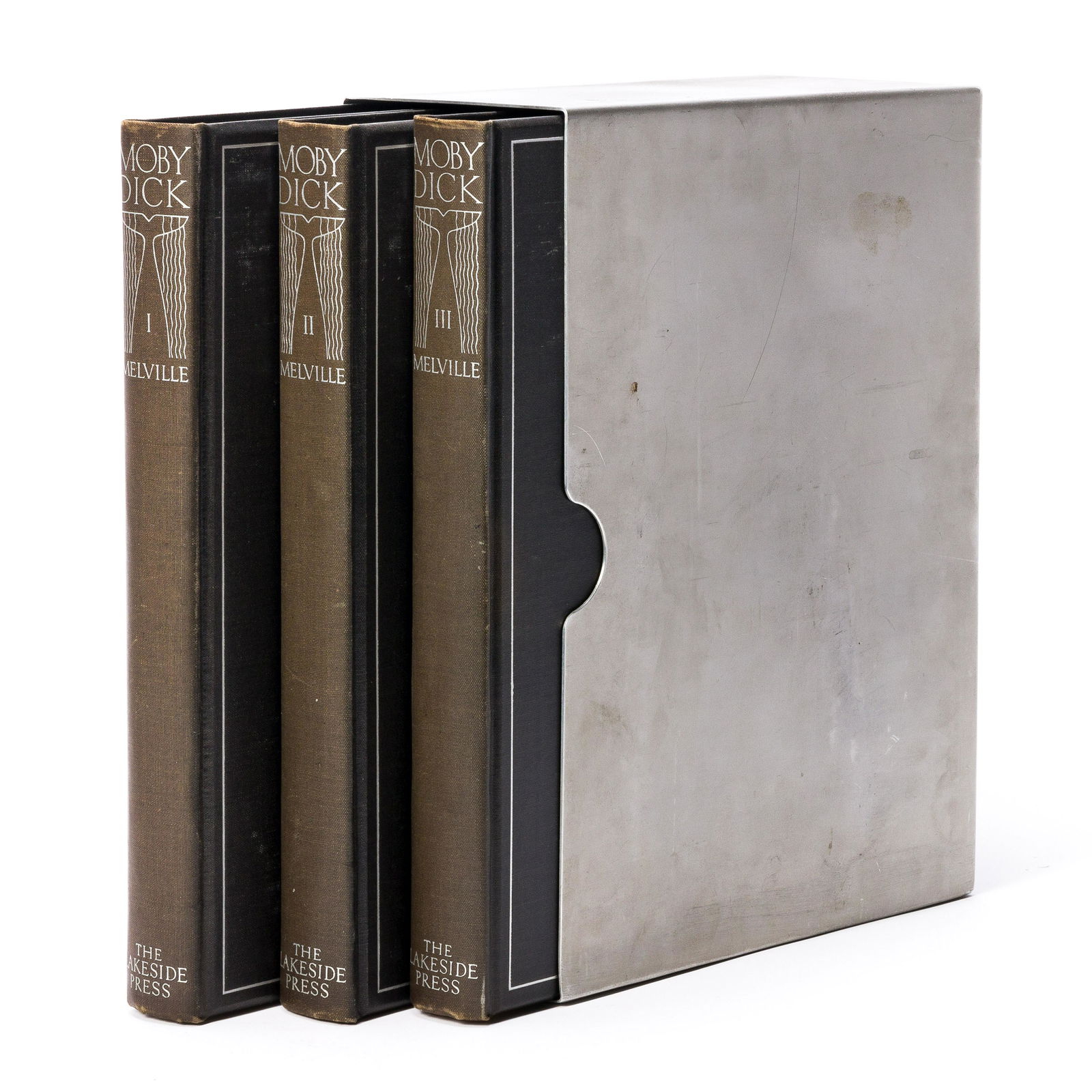 (KENT, ROCKWELL.) Melville, Herman. Moby Dick, or, The Whale.: (KENT, ROCKWELL.) Melville, Herman. Moby Dick, or, The Whale. 3 volumes. Illustrated profusely by Kent. Large 4to, publisher's silver-stamped black cloth over beveled boards, lightly scuffed; usual of