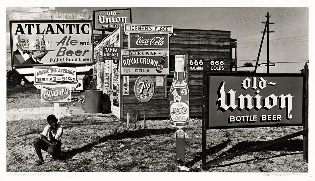 ARNOLD NEWMAN (1918-2006) Billboards, West Palm Beach, FL.: ARNOLD NEWMAN (1918-2006) Billboards, West Palm Beach, FL. Silver print, the image measuring 6x12½ inches (17.5x31.8 cm.), the sheet 11x14 inches (27.9x35.6 cm.), with Newman’s signature, t