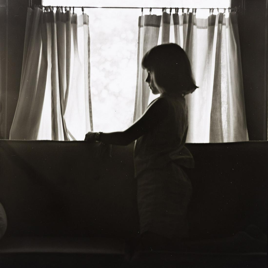 RALPH EUGENE MEATYARD (1925-1972) Untitled (Girl in front of a window).: RALPH EUGENE MEATYARD (1925-1972) Untitled (Girl in front of a window). Silver print, the image measuring 7 inches (19.4 cm.) square, the sheet 8x10 inches (20.3x25.4 cm.), with Madelyn O. Meatyard