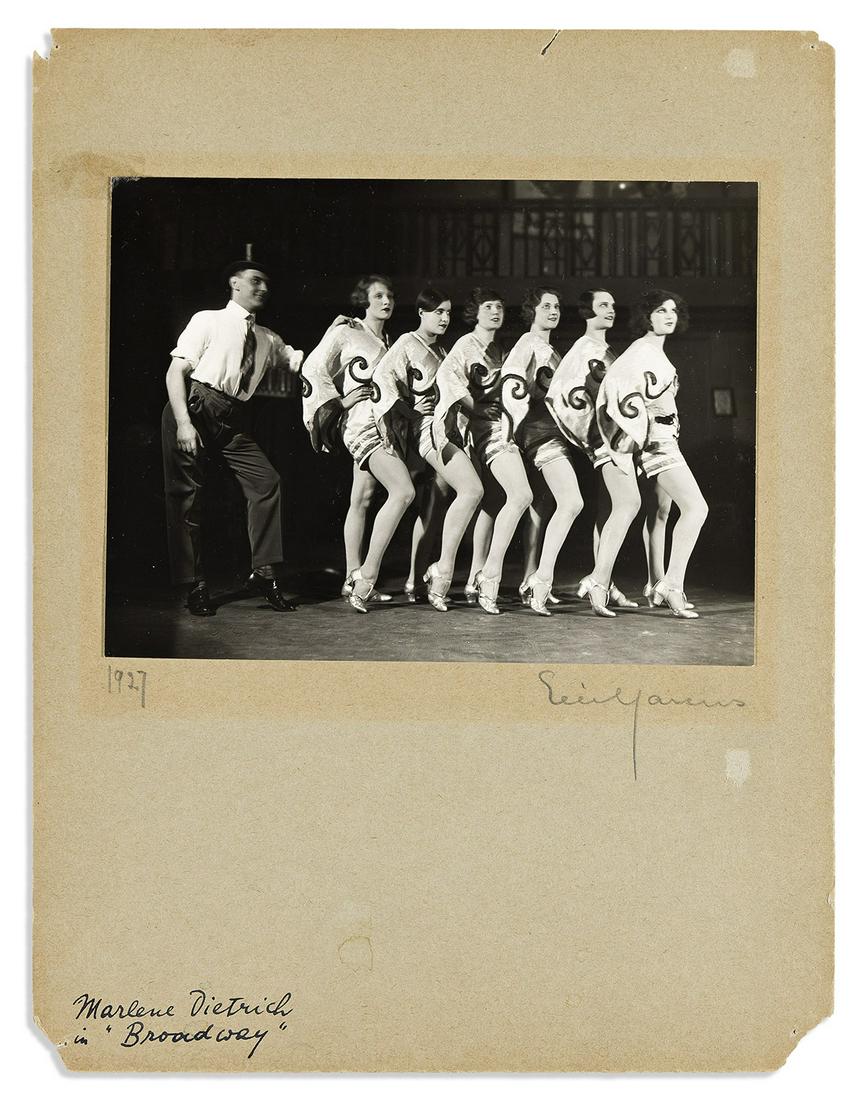 Marcus, Elli (1899-1977) Photograph of Marlene Dietrich.: Marcus, Elli (1899-1977) Photograph of Marlene Dietrich. Berlin, 1927.Vintage gelatin silver print on original mount (corners of the mount chipped, pin holes) signed in pencil by Marcus and dated 1927