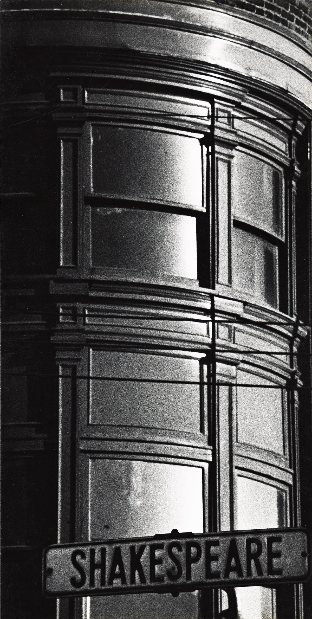 W. EUGENE SMITH (1918-1978) Shakespeare Street, Pittsburgh.: W. EUGENE SMITH (1918-1978) Shakespeare Street, Pittsburgh. Silver print, the image measuring 13½x6 inches (34.3x17.5 cm.), the mount 20x16 inches (50.8x40.6 cm.), with Smith's credit and Estate