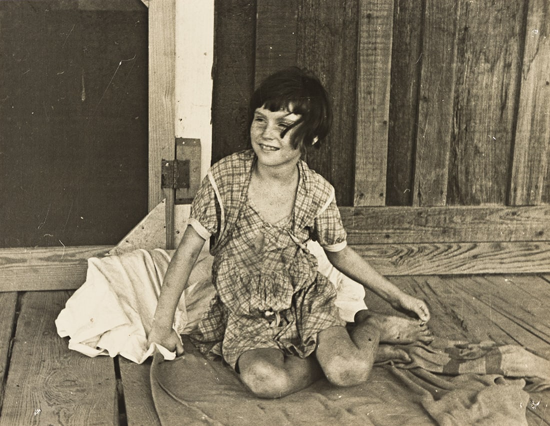 ARTHUR ROTHSTEIN (1915-1985) Sharecropper's Daughter, Arkansas.: ARTHUR ROTHSTEIN (1915-1985) Sharecropper's Daughter, Arkansas. Silver print, the image measuring 7½x9¾ inches (19.1x4.8 cm.), with Rothstein's FSA credit stamp and the title and RA number i