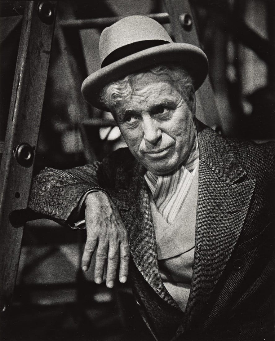 W. EUGENE SMITH (1918-1978) From the series Chaplin at Work, portrait of Charlie Chaplin making the: W. EUGENE SMITH (1918-1978) From the series Chaplin at Work, portrait of Charlie Chaplin making the film Limelight, Hollywood, California. Silver print, the image measuring 13½x10¾ inches (3