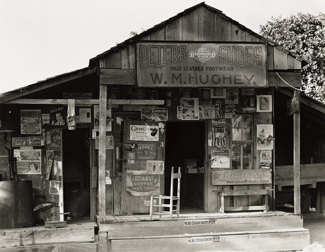 WALKER EVANS (1903-1975) Country Store near Moundville, Alabama.: WALKER EVANS (1903-1975) Country Store near Moundville, Alabama. Silver print, the image measuring 7x9 inches (18.7x23.8 cm.), the sheet slightly larger, with the Library of Congress stamp and a numer