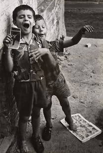 DAVE HEATH (1931-2016) Chicago (laughing boys).: DAVE HEATH (1931-2016) Chicago (laughing boys). Silver print, the image measuring 9x6½ inches (24.4x16.5 cm.), the mount 14x11 inches (35.6x27.9 cm.), with Heath's signature, address, and numeric