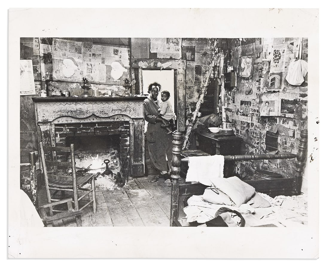 (PHOTOGRAPHY.) [Bruce Davidson.] Sharecropper's Cabin, Trickem Forks, Near Selma, Alabama.: (PHOTOGRAPHY.) [Bruce Davidson.] Sharecropper's Cabin, Trickem Forks, Near Selma, Alabama. Photograph, 8 x 10 inches, with Office of Economic Opportunity sticker, inked newspaper stamp, and two relate