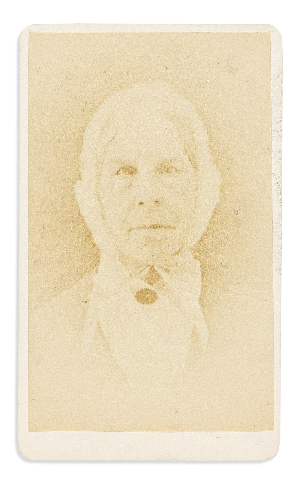 Grimké, Sarah Moore (1792-1873) Carte-de-visite.: Grimké, Sarah Moore (1792-1873) Carte-de-visite. Boston: Allen & Rowell, circa 1860s. Faded photographic image mounted on publisher's card, identified on verso; 4 1/4 x 2 1/2 in. Abolitionist Gri