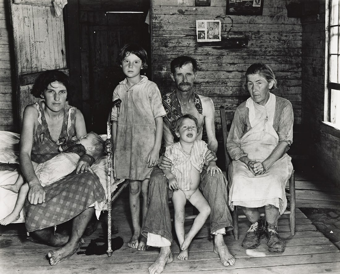 WALKER EVANS (1903-1975) Sharecropper Bud Fields and His Family at Home, Hale County, Alabama.: WALKER EVANS (1903-1975) Sharecropper Bud Fields and His Family at Home, Hale County, Alabama. Silver print, the image measuring 7½x9½ inches (19.1x24.1 cm.), the sheet slightly larger, with