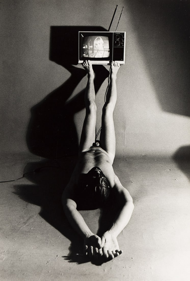 JIMMY DESANA (1949-1990) Television, from the series Submission.: JIMMY DESANA (1949-1990) Television, from the series Submission. Silver print, the image measuring 324x222 mm; 12¾x8¾ inches, the sheet 356x238 mm; 14x9⅜ inches, with DeSana's signatur