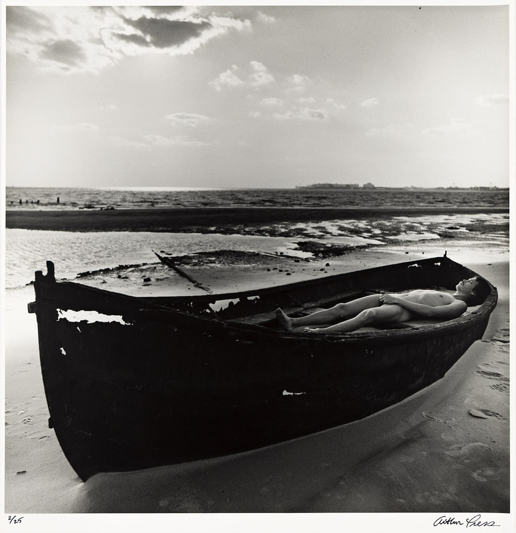 ARTHUR TRESS (1940- ) Nude man in boat.: NUDE MAN ARTHUR TRESS (1940- ) Nude man in boat. Silver print, the image measuring 400 mm; 15¾ inches square, the sheet 508x406 mm; 20x16 inches, with Tress' signature and edition notation 2/25 i