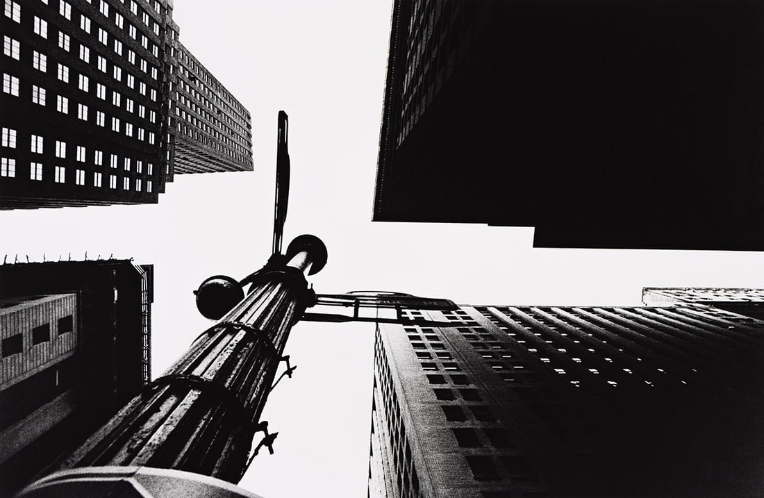 WILLIAM KLEIN (1928-2022) Wall Street from Below. 1954; printed 1990s.: WILLIAM KLEIN (1928-2022) Wall Street from Below. 1954; printed 1990s. Silver print, the image measuring 36½x56 cm, 14⅜x22 inches, the sheet 50¾x61 cm, 20x24 inches; with Klein's signa