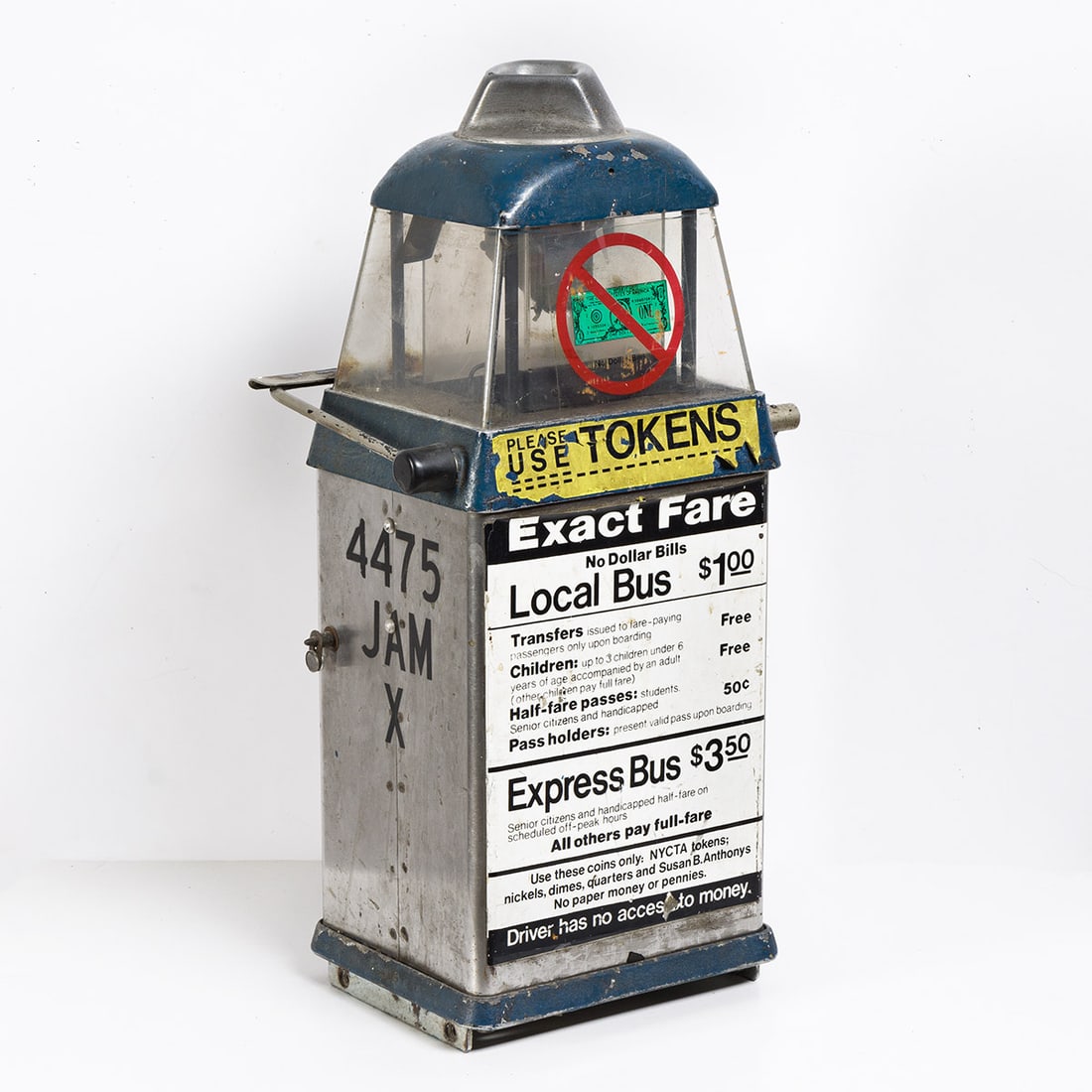 DESIGNER UNKNOWN New York City Bus Token Fare Box. Circa 1986-1989.: DESIGNER UNKNOWN New York City Bus Token Fare Box. Circa 1986-1989. Metal and plastic token fare box with affixed rate stickers from a New York City bus. 61x30½x20¼ cm, 24x12x8 inches. New Y