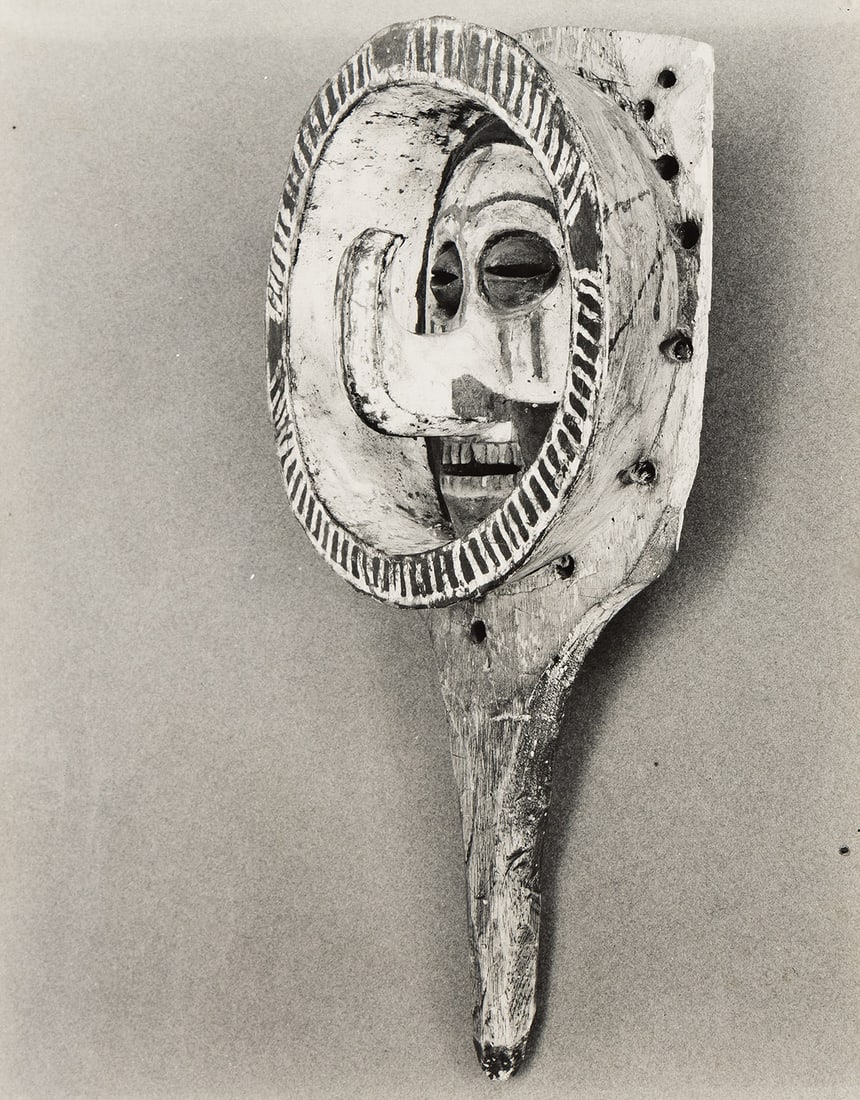 WALKER EVANS (1903-1975) Mask, Basonge, Congo. 1935.: WALKER EVANS (1903-1975) Mask, Basonge, Congo. 1935. Silver print, the image measuring 10x8 inches (25.4x20.3 cm.), with the Lunn Gallery stamp with the notations "XX" and "457" in pencil on verso.