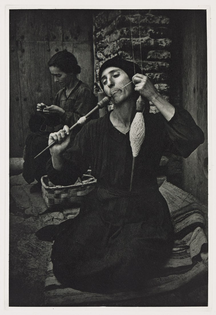 W. EUGENE SMITH (1918-1978) The Spinner. 1951; printed later.: W. EUGENE SMITH (1918-1978) The Spinner. 1951; printed later. Hand-pulled dust-grained photogravure, the image measuring 12½x8⅜ inches (31.8x21.3 cm.), the sheet 20x16 inches (50.8x40.6 cm.