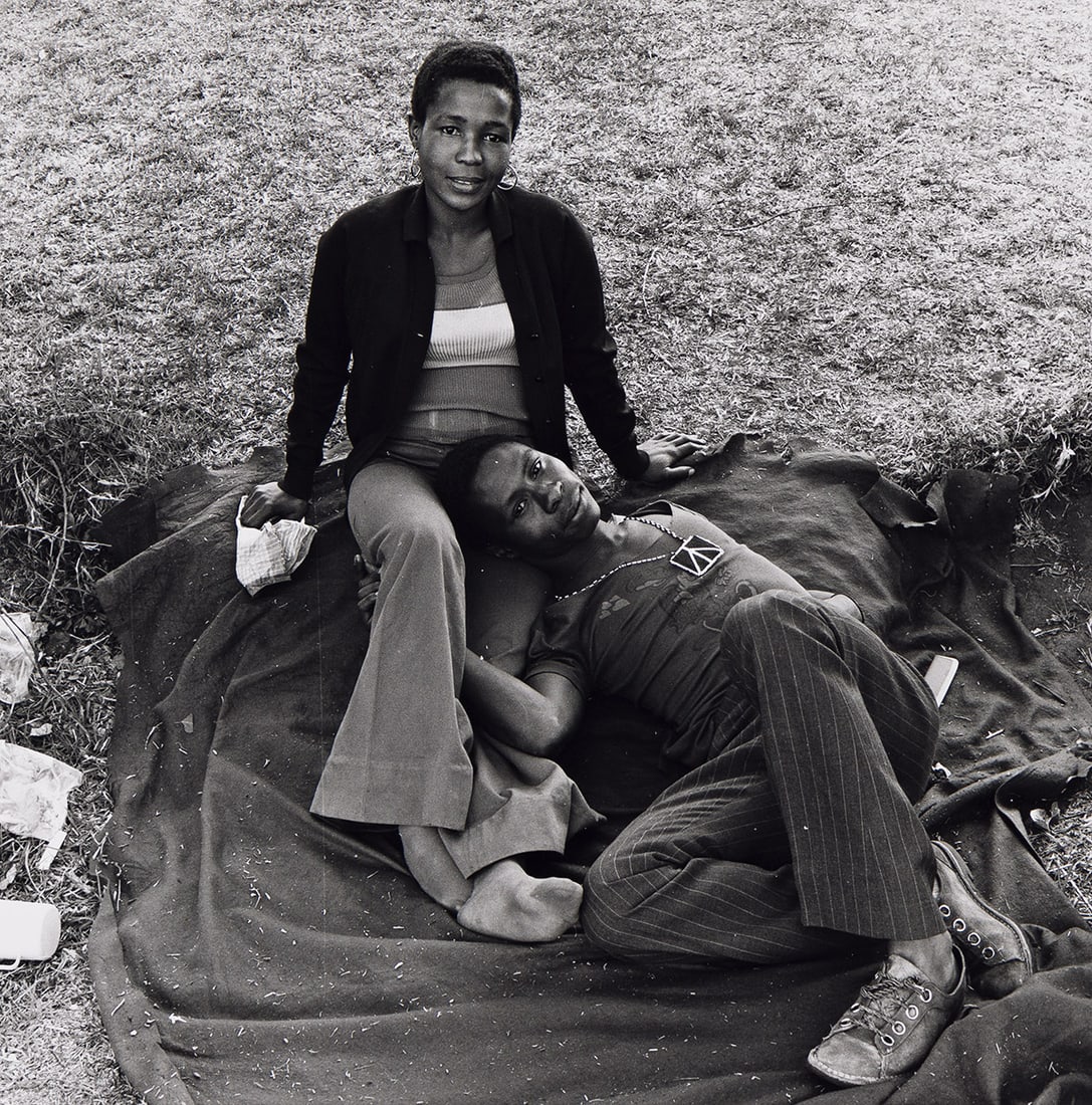 DAVID GOLDBLATT (1930-2018) Lulu Gebasne and Solomon Mlutshana, Mofolo Park, Soweto. 1972.: DAVID GOLDBLATT (1930-2018) Lulu Gebasne and Solomon Mlutshana, Mofolo Park, Soweto. 1972. Silver print, the image measuring 5⅞ inches (14.9 cm.) square, the sheet 10x8 inches (25.4x20.3 cm.), u
